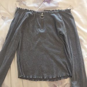 A gray long sleeve shirt